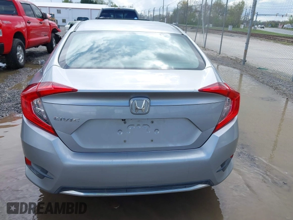 2019 Honda Civic LX with VIN 19XFC2F61KE009471, listed as a IAAI auction lot 42017532 with 81,134 mi miles and . Bid and sale history available at DreamBid. Image 16.