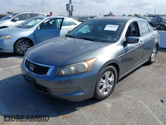 2009 Honda Accord LX-P with VIN JHMCP26459C007437, listed as a IAAI auction lot 41896268 with 221,522 mi miles and . Bid and sale history available at DreamBid. Image 2.