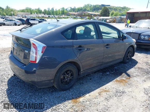 2013 Toyota Prius One with VIN JTDKN3DU0D5691290, listed as a IAAI auction lot 42138179 with 102,003 mi miles and . Bid and sale history available at DreamBid. Image 4.