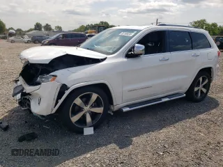 2015 Jeep Grand Cherokee Overland with VIN 1C4RJFCG6FC797653, listed as a Copart auction lot 65186695 with Not provided miles and Salvage title. Bid and sale history available at DreamBid. Image 1.