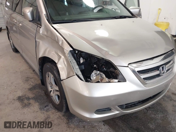 2006 Honda Odyssey EX-L z VIN 5FNRL38746B461357, wystawiony jako IAAI lot #41040746 z przebiegiem 256 047 mil mil oraz . Historia ofert i sprzedaży dostępna na DreamBid. Obrazek 6.
