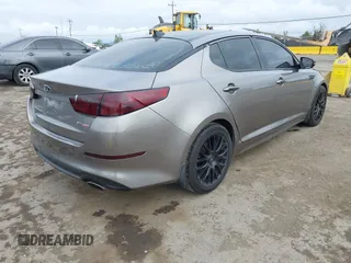 2015 Kia Optima EX with VIN 5XXGN4A7XFG423145, listed as a IAAI auction lot 42068943 with 113,730 mi miles and . Bid and sale history available at DreamBid. Image 4.