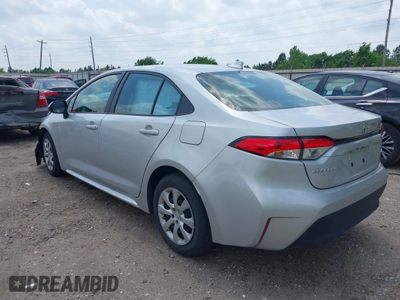 2023 Toyota Corolla LE with VIN 5YFB4MDE7PP015928, listed as a IAAI auction lot 42115319 with 60,434 mi miles. Bid and sale history available at carsss.com. Image 3.