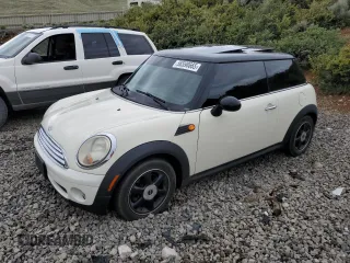 2007 MINI Hardtop z VIN WMWMF33567TT56922, wystawiony jako Copart lot #56598665 z przebiegiem 66 605 mil mil oraz Szkoda całkowita • Salvage title. Historia ofert i sprzedaży dostępna na DreamBid. Obrazek 1.