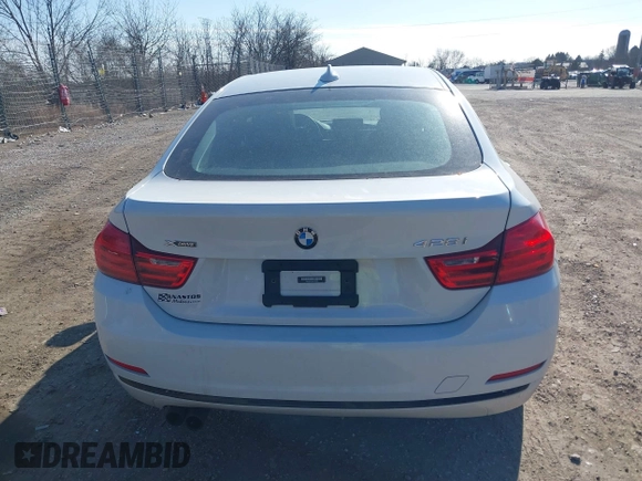 2016 BMW 4 Series 428i xDrive with VIN WBA4C9C59GG138090, listed as a IAAI auction lot 41560267 with 94,010 mi miles and . Bid and sale history available at carsss.com. Image 16.