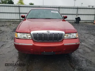 1999 Mercury Grand Marquis LS с VIN 2MEFM75W9XX701991, выставлен на аукционе Copart как лот 58388085 с пробегом 163 160 миль миль и Списание • Salvage title. История ставок и продаж доступна на DreamBid. Изображение 5.