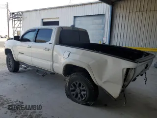 2021 Toyota Tacoma SR5 z VIN 3TMBZ5DN6MM031399, wystawiony jako Copart lot #82078704 z przebiegiem 139 358 mil mil oraz Czysty tytuł • Clean title. Historia ofert i sprzedaży dostępna na DreamBid. Obrazek 2.
