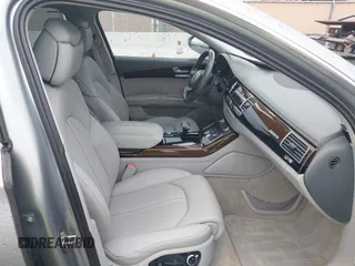 2012 Audi A8 z VIN WAURVAFD5CN008320, wystawiony jako IAAI lot #41508237 z przebiegiem 183 398 mil mil oraz . Historia ofert i sprzedaży dostępna na DreamBid. Obrazek 5.