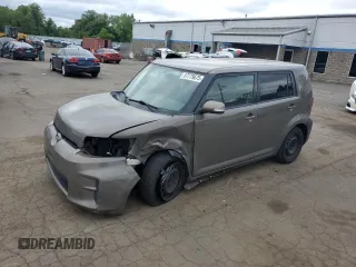 2012 Scion xB z VIN JTLZE4FE1CJ014494, wystawiony jako Copart lot #57779675 z przebiegiem 151 857 mil mil oraz Szkody całkowita. Historia ofert i sprzedaży dostępna na DreamBid. Obrazek 1.