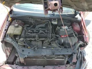 2007 Ford Focus S z VIN 1FAFP31N37W130031, wystawiony jako Copart lot #60123195 z przebiegiem 154 833 mil mil oraz Szkoda całkowita • Salvage title. Historia ofert i sprzedaży dostępna na DreamBid. Obrazek 11.