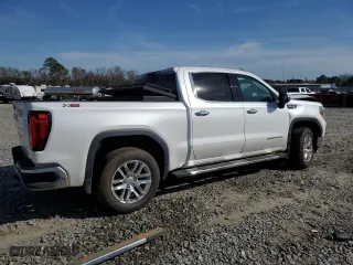 2019 GMC Sierra 1500 SLT with VIN 1GTU9DED0KZ123550, listed as a Copart auction lot 46444475 with 128,404 mi miles and Salvage Title. Bid and sale history available at carsss.com. Image 3.