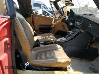 1982 Alfa Romeo Spider Veloce z VIN ZARBA541XC1014224, wystawiony jako Copart lot #58939635 z przebiegiem 176 635 mil mil oraz Czysty tytuł • Clean title. Historia ofert i sprzedaży dostępna na DreamBid. Obrazek 7.