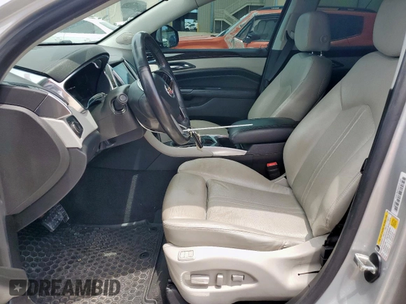 2013 Cadillac SRX Luxury Collection z VIN 3GYFNCE37DS523394, wystawiony jako Copart lot #57817035 z przebiegiem 379 637 mil mil oraz Szkoda całkowita • Salvage title. Historia ofert i sprzedaży dostępna na DreamBid. Obrazek 7.