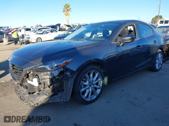 2014 Mazda 3 S Grand Touring with VIN JM1BM1W36E1112033, listed as a IAAI auction lot 41412655 with 115,050 mi miles and . Bid and sale history available at DreamBid. Image 2.