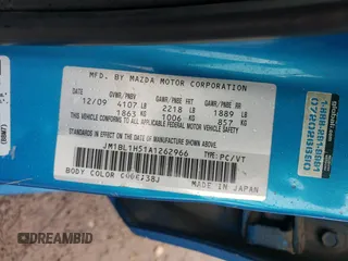 2010 Mazda 3 S Sport z VIN JM1BL1H51A1262966, wystawiony jako Copart lot #57257665 z przebiegiem 215 973 mil mil oraz Szkoda całkowita • Salvage title. Historia ofert i sprzedaży dostępna na DreamBid. Obrazek 13.