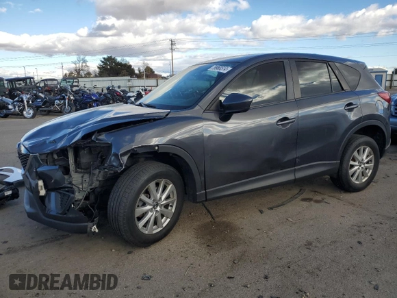 2015 Mazda CX-5 Sport with VIN JM3KE4BE0F0441203, listed as a Copart auction lot 79968514 with 134,890 mi miles and Salvage title. Bid and sale history available at DreamBid. Image 1.