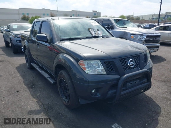 2014 Nissan Frontier SV with VIN 1N6AD0ER8EN756702, listed as a IAAI auction lot 42021294 with 135,143 mi miles and . Bid and sale history available at DreamBid. Image 14.