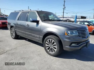 2015 Lincoln Navigator z VIN 5LMJJ3HT2FEJ12367, wystawiony jako Copart lot #56930865 z przebiegiem 71 415 mil mil oraz Szkody całkowita. Historia ofert i sprzedaży dostępna na DreamBid. Obrazek 4.