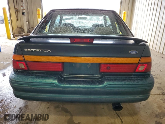 1996 Ford Escort z VIN 1FASP11J0TW123967, wystawiony jako Copart lot #52859835 z przebiegiem 164 693 mil mil oraz Szkoda całkowita • Salvage title. Historia ofert i sprzedaży dostępna na DreamBid. Obrazek 6.