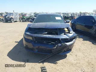 2015 Dodge Charger SXT with VIN 2C3CDXHG5FH789718, listed as a IAAI auction lot 42136480 with 168,633 mi miles and . Bid and sale history available at DreamBid. Image 6.