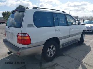 2001 Toyota Land Cruiser with VIN JTEHT05J412011211, listed as a IAAI auction lot 41978366 with 183,684 mi miles. Bid and sale history available at carsss.com. Image 4.