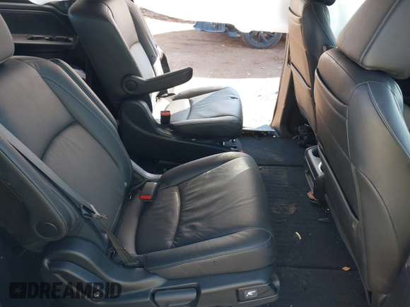 2023 Honda Odyssey Touring with VIN 5FNRL6H84PB005208, listed as a IAAI auction lot 41374452 with 60,288 mi miles and . Bid and sale history available at DreamBid. Image 8.