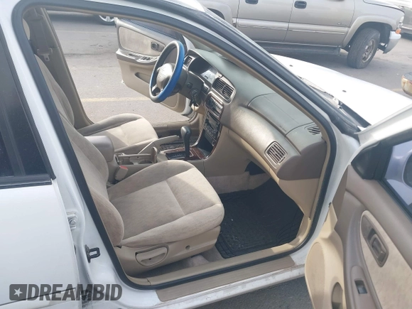 1999 Nissan Altima XE with VIN 1N4DL01DXXC189667, listed as a IAAI auction lot 41715276 with 132,425 mi miles. Bid and sale history available at carsss.com. Image 5.