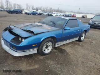 1985 Chevrolet Camaro Z28 Sport with VIN 1G1FP87H2FN114697, listed as a Copart auction lot 89329895 with 0 mi miles and Salvage Title. Bid and sale history available at carsss.com. Image 1.