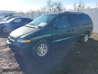 1999 Dodge Caravan SE with VIN 2B4GP44G9XR135970, listed as a IAAI auction lot 41714951 with 173,451 mi miles. Bid and sale history available at carsss.com. Image 2.