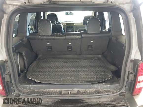 2012 Jeep Liberty Sport with VIN 1C4PJMAK9CW176792, listed as a IAAI auction lot 41685594 with 213,748 mi miles. Bid and sale history available at carsss.com. Image 16.