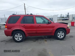 2006 Ford Escape Hybrid with VIN 1FMCU96H96KA52738, listed as a IAAI auction lot 41773608 with 214,834 mi miles and . Bid and sale history available at DreamBid. Image 13.