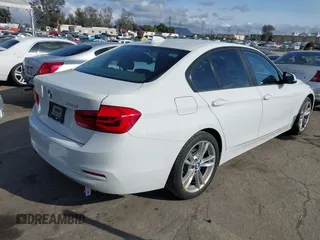 2018 BMW 3 Series 320i with VIN WBA8A9C54JAH12017, listed as a IAAI auction lot 41921292 with 49,267 mi miles. Bid and sale history available at carsss.com. Image 4.
