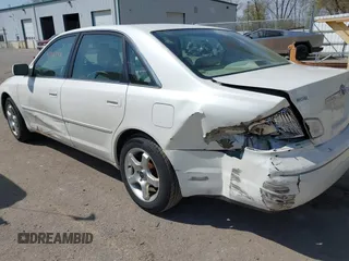 2001 Toyota Avalon XL z VIN 4T1BF28B71U120232, wystawiony jako IAAI lot #42116948 z przebiegiem 196 266 mil mil oraz . Historia ofert i sprzedaży dostępna na DreamBid. Obrazek 6.