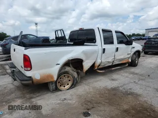 2002 Ford F-250 XL with VIN 1FTNW20F32EA27266, listed as a Copart auction lot 63110855 with 265,546 mi miles and Salvage title. Bid and sale history available at DreamBid. Image 3.