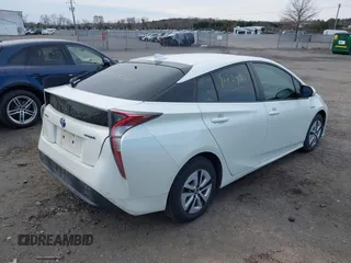 2018 Toyota Prius Two with VIN JTDKARFU1J3547525, listed as a IAAI auction lot 41739561 with 148,300 mi miles. Bid and sale history available at carsss.com. Image 4.