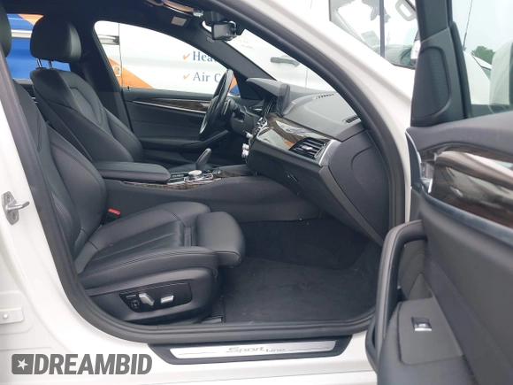2018 BMW 5 Series 530i xDrive with VIN WBAJA7C5XJG907944, listed as a IAAI auction lot 42290336 with 111,512 mi miles and . Bid and sale history available at DreamBid. Image 5.