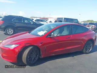 2025 Tesla Model 3 Long Range with VIN 5YJ3E1EA6SF967254, listed as a IAAI auction lot 42345651 with 1,180 mi miles and . Bid and sale history available at DreamBid. Image 6.