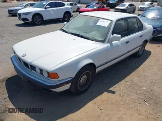 1994 BMW 7 Series z VIN WBAGD4324RDE65491, wystawiony jako IAAI lot #42761773 z przebiegiem 141 762 mil mil oraz . Historia ofert i sprzedaży dostępna na DreamBid. Obrazek 2.