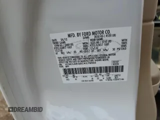 2012 Ford Escape Limited z VIN 1FMCU0EG5CKC78503, wystawiony jako Copart lot #56742405 z przebiegiem 138 324 mil mil oraz Szkoda całkowita • Salvage title. Historia ofert i sprzedaży dostępna na DreamBid. Obrazek 13.