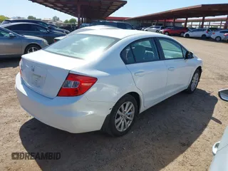 2012 Honda Civic EX with VIN 19XFB2F8XCE041230, listed as a IAAI auction lot 42142714 with 118,382 mi miles and . Bid and sale history available at DreamBid. Image 4.