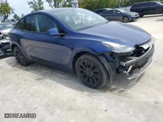 2023 Tesla Model Y Long Range with VIN 7SAYGDEE3PF832070, listed as a Copart auction lot 50065335 with 13,469 mi miles and Salvage Title. Bid and sale history available at carsss.com. Image 4.