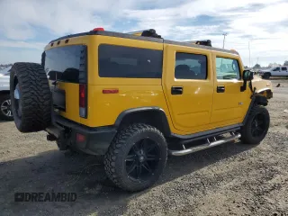 2006 Hummer H2 with VIN 5GRGN23U26H100166, listed as a Copart auction lot 87228964 with 71,727 mi miles and Salvage Title. Bid and sale history available at carsss.com. Image 3.