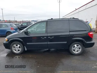 2007 Dodge Caravan SXT with VIN 1D4GP45R87B161237, listed as a IAAI auction lot 41594127 with 154,508 mi miles and . Bid and sale history available at DreamBid. Image 14.