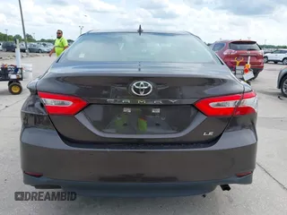 2019 Toyota Camry LE with VIN 4T1B11HKXKU818442, listed as a IAAI auction lot 41906128 with 30,728 mi miles and . Bid and sale history available at DreamBid. Image 17.