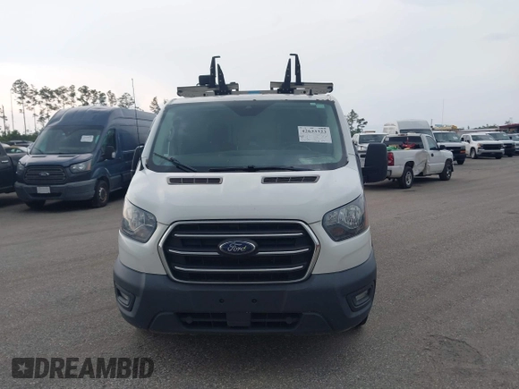 2020 Ford Transit Cargo with VIN 1FTBR1Y8XLKA19646, listed as a IAAI auction lot 42633323 with 82,577 mi miles and . Bid and sale history available at DreamBid. Image 12.