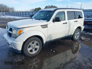 2008 Dodge Nitro SLT with VIN 1D8GT58K68W288772, listed as a IAAI auction lot 41621789 with 187,410 mi miles. Bid and sale history available at carsss.com. Image 2.