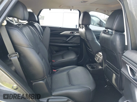 2020 Mazda CX-9 Touring z VIN JM3TCACY5L0412308, wystawiony jako IAAI lot #41208401 z przebiegiem 37 029 mil mil oraz . Historia ofert i sprzedaży dostępna na DreamBid. Obrazek 8.