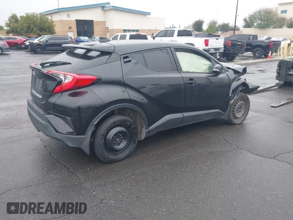 2021 Toyota C-HR LE with VIN JTNKHMBX9M1116943, listed as a IAAI auction lot 41369464 with Not Provided miles. Bid and sale history available at carsss.com. Image 4.