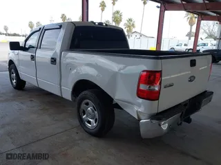 2007 Ford F-150 XLT with VIN 1FTPW12597KD31606, listed as a IAAI auction lot 41735597 with 196,934 mi miles. Bid and sale history available at carsss.com. Image 3.