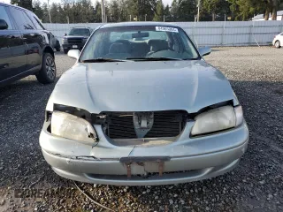 1999 Mazda 626 ES with VIN 1YVGF22C1X5835600, listed as a Copart auction lot 84965004 with 217,352 mi miles and Salvage Title. Bid and sale history available at carsss.com. Image 5.